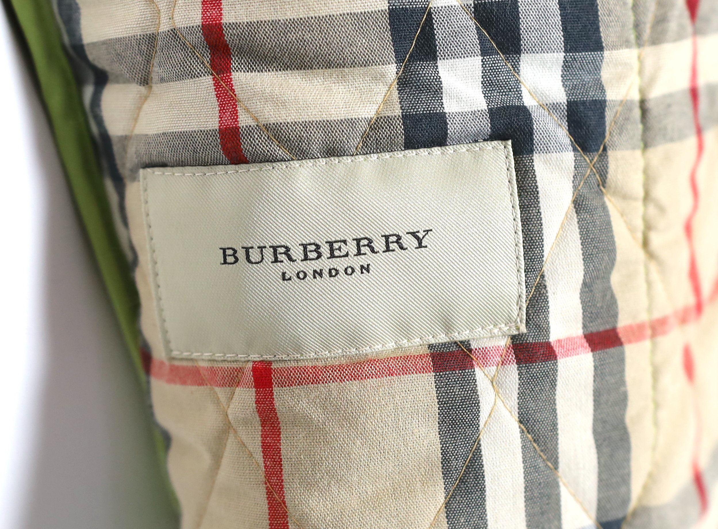 Two Burberry lady's quilted jackets, one pink and the other green, size Medium